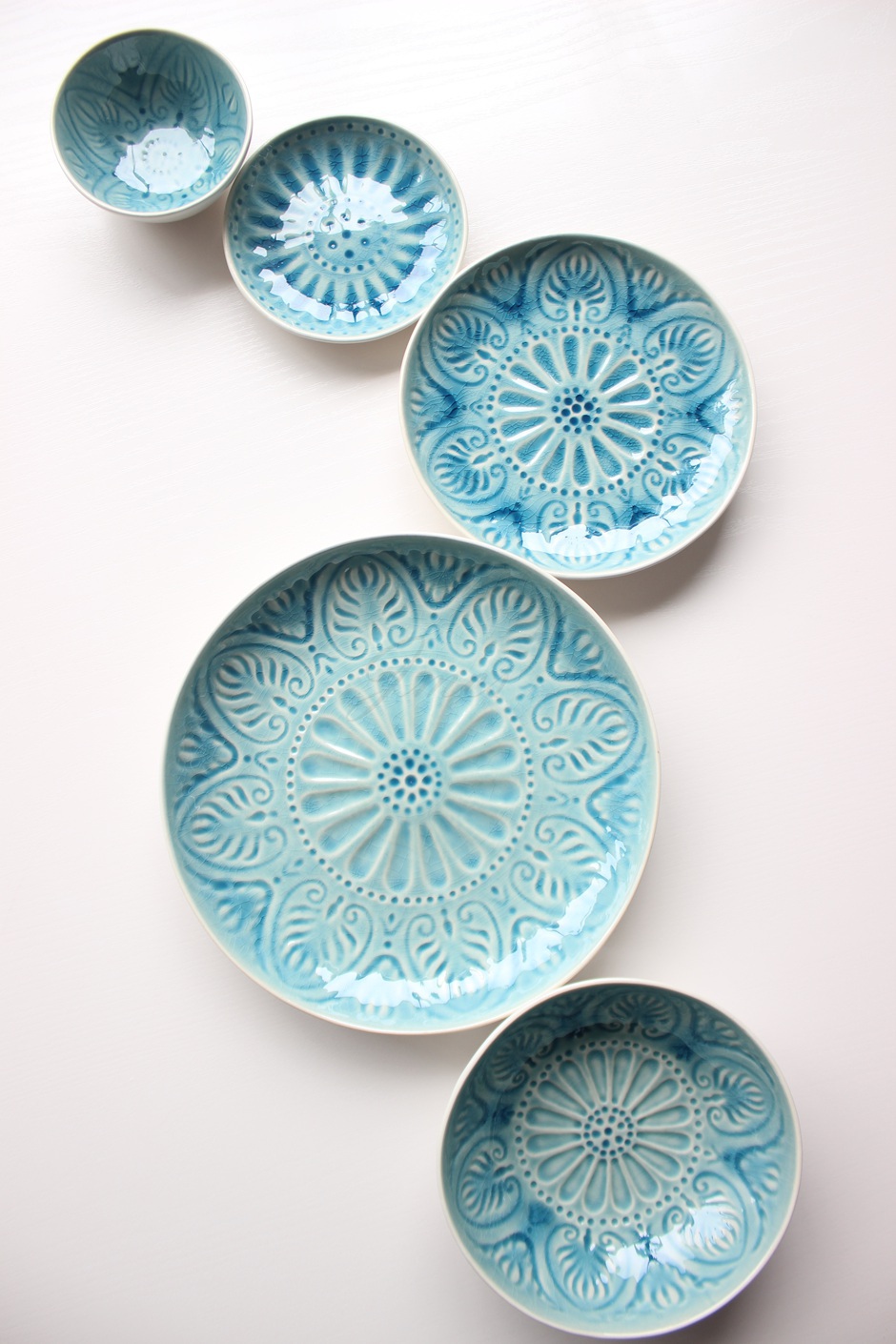 Embossed crack glaze